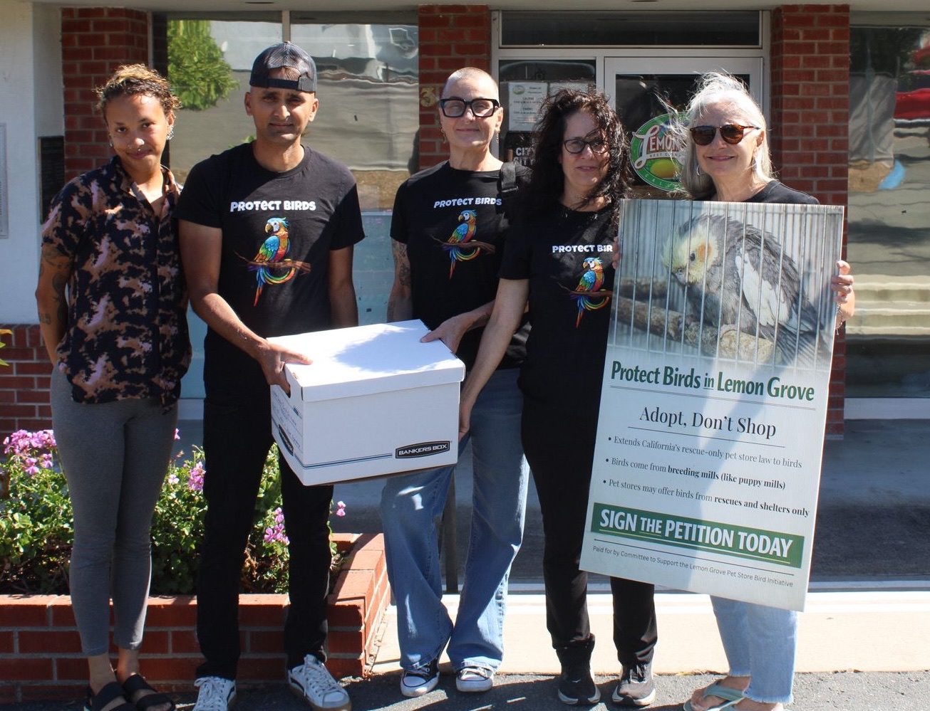 SXFA team delivering petition signatures for the Lemon Grove bird initiative